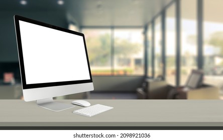 Computer Desktop With Blank Screen On Service Counter In Blurry Background With Parcel Delivery Office Express, EMS.