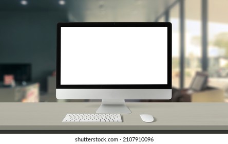 Computer Desktop With Blank Screen On Service Counter In Blurry Background With Parcel Delivery Office Express, EMS.