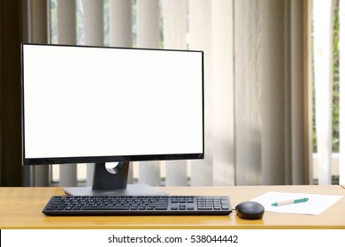 Computer, Desktop PC. for business blank screen on blur of curtain window background.