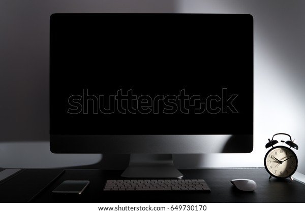 computer desktop technology concept\
retina display with keyboard mouse smart phone and alarm\
clock