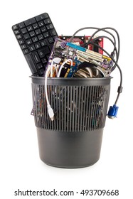 Computer Details In The Trash. On White, Isolated Background.