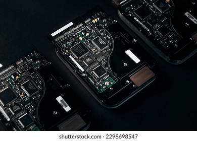 Computer disassembled HDD hard drive data disc SSD, backup part of the PC or laptop. Recovery, fixing technology maintenance work, access file. Engineer profession repairman
					