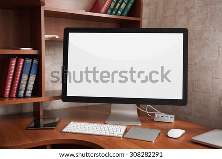 Computer display with blank white screen. Front view.