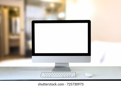 Computer empty screen on table with home office.