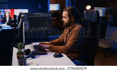 Computer engineer deliberating ways of fixing errors while developing code on PC. IT professional brainstorming ways of solving database errors, remotely working from home.