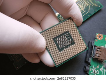 A computer engineer working with CPU. Central Processor Unit as a semiconductor component.  - Powered by Shutterstock - Get 15% off with code: PIKWIZARD15