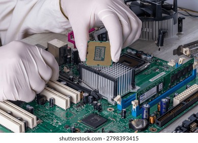 Computer Engineer Working With Processor And Motherboard In Technical Service Laboratory