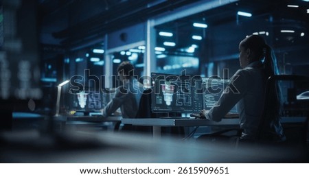 Computer Engineering Team Working in a Research Center on Quantum Hardware Development, Analyzing Data in an Industrial Laboratory. Diverse Specialists Focusing on Future Technology