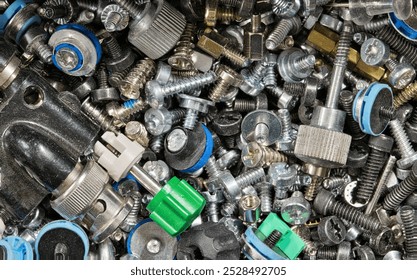 Computer fasteners hardware assorted odds and ends technology background.