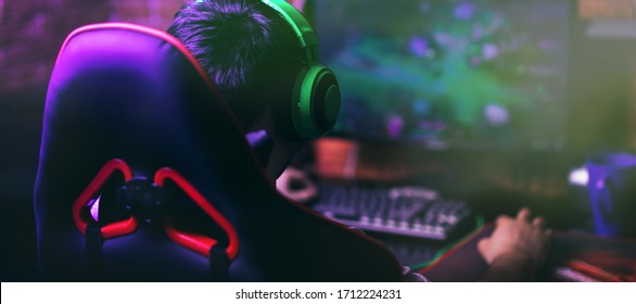 Computer Games, Playing Place, Young Gamer Plays Computer Games With Headphones,