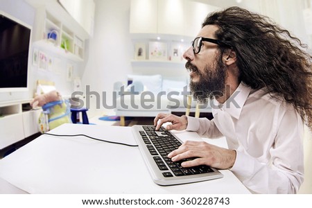 Computer geek portrait with keyboard and eyeglasses
