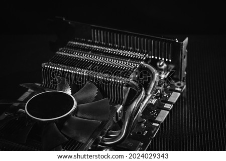 Computer graphic videocard over dark background