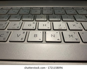 Computer with gray keyboard. Work from home