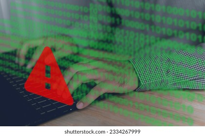 Computer hack warning,System hacked warning alert on notebook (Laptop),cyber security concept,The danger of malware viruses,ransomware virus,triangle caution warning sign notification error	