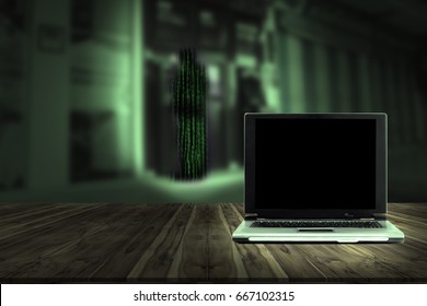 Computer with hacker Automatic Teller Machine blur background