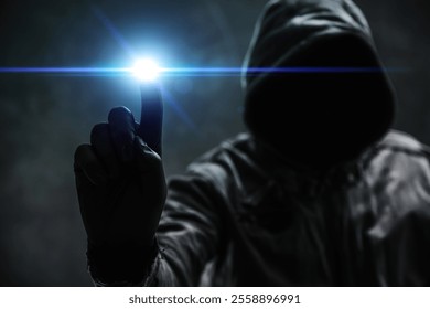 Computer hacker in hoodie using virtual screen. Database hacking, computer virus malware and cybersecurity concept. Selective focus. - Powered by Shutterstock