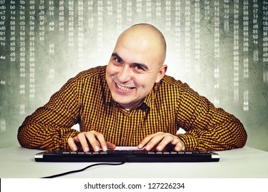 Computer hacker sitting at the table with keyboard in front of the monitor. Heartbleed bug concept,
