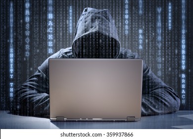 Computer hacker stealing data from a laptop concept for network security, identity theft and computer crime - Powered by Shutterstock