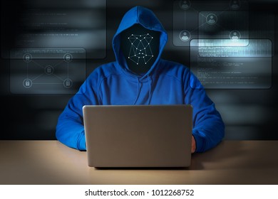 Computer hacker steals data from laptop. Method of face recognition. Theft of personal data and computer crimes.