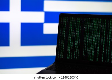 computer hacking in front of flag