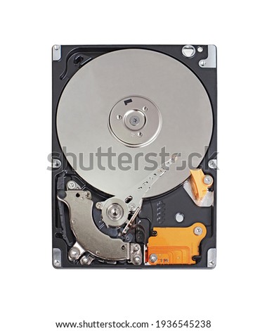 Computer hard disk drive opened  isolated on white background