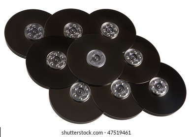 Computer hard drive disc plates in pattern, isolated over white background.