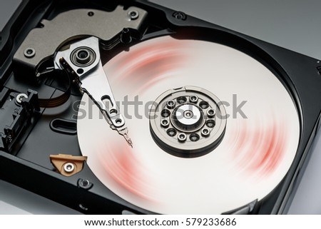 computer hard drive working closeup with details