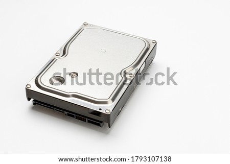 Computer harddisk without case on white background 
