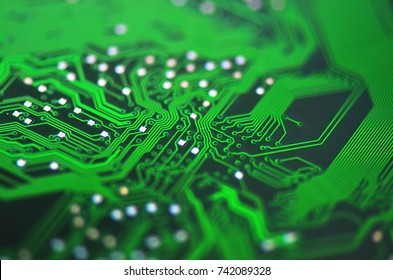 Computer hardware. Close Up electronic circuit board background, green color. Selective Focus.  - Powered by Shutterstock - Get 15% off with code: PIKWIZARD15