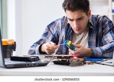 Computer hardware repair and fixing concept by experienced techn - Shutterstock ID 1090060055