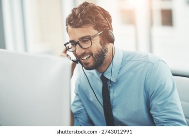 Computer, headset and happy man in call center for networking, customer support and sales pitch. Lead generation, contact or employee with tech for telemarketing, client assurance or building rapport