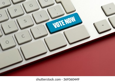 Computer key showing the word VOTE NOW