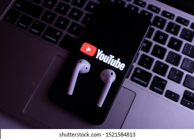 Computer Keyboard, Airpods 2 And Iphone 11 Pro With The YouTube Logo Which Is A Website Dedicated To Sharing Videos. United States, New York, Thursday, October 3, 2019.