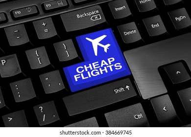 Computer keyboard with blue cheap flights button - Shutterstock ID 384669745