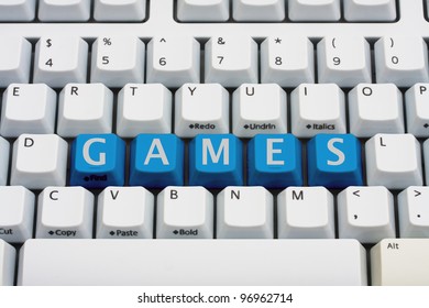 A computer keyboard with blue keys spelling games, Playing computer games