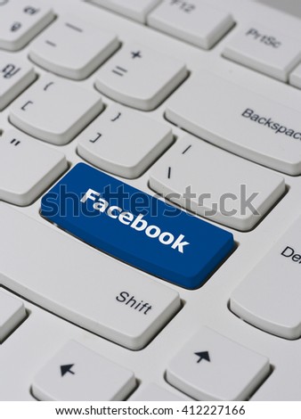 Computer keyboard button with facebook text