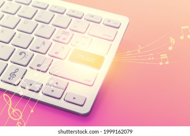 Computer Keyboard And Flying Music Notes On Color Background