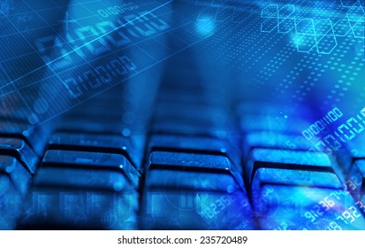 Computer keyboard with glowing codes, programming concept