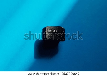 A computer keyboard key with the word 