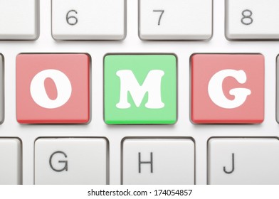 A computer keyboard with keys spelling OMG, Internet slang 