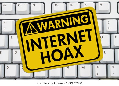 Computer Keyboard Keys With Warning Sign With Words Internet Hoax, Warning Of Internet Hoax