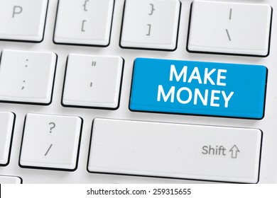 Computer keyboard with make money wbuton. Computer keyboard with make money button concept