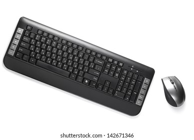 computer keyboard and mouse silver color on a white background