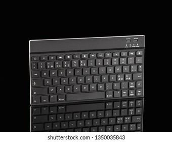 computer keyboard on black background