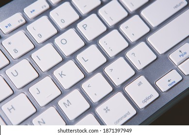 Computer Keyboard And On The Desk Close Up.