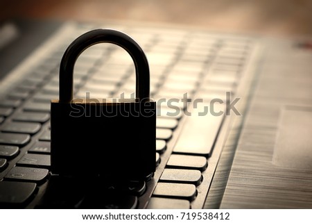   Computer keyboard and padlock as a symbol of Internet security                            