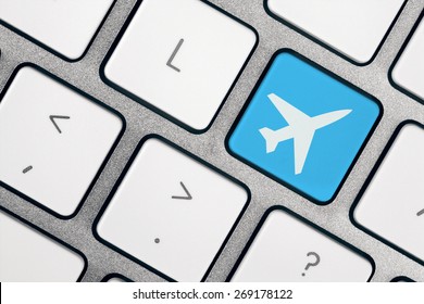 Computer Keyboard with plane - book your flights online