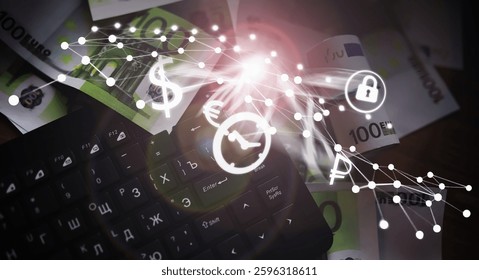 Computer keyboard and a scattering of 100 euro bills on the table. The work of a programmer and blogger on Internet.