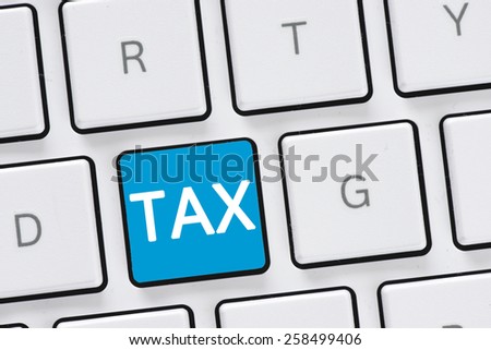 Computer keyboard with tax button.Â Computer keyboard with tax button concept
