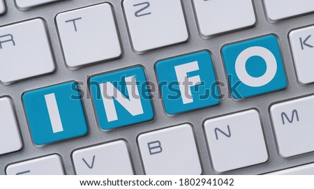 A  computer keyboard with the word Info